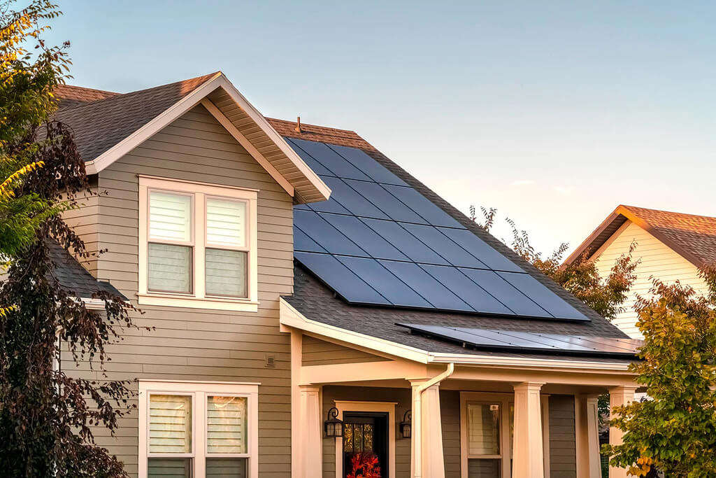 A house with a solar panel on the roof