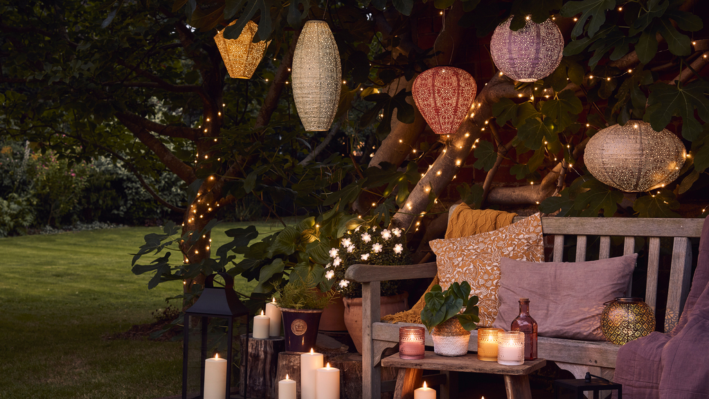 Lantern and candles in garden