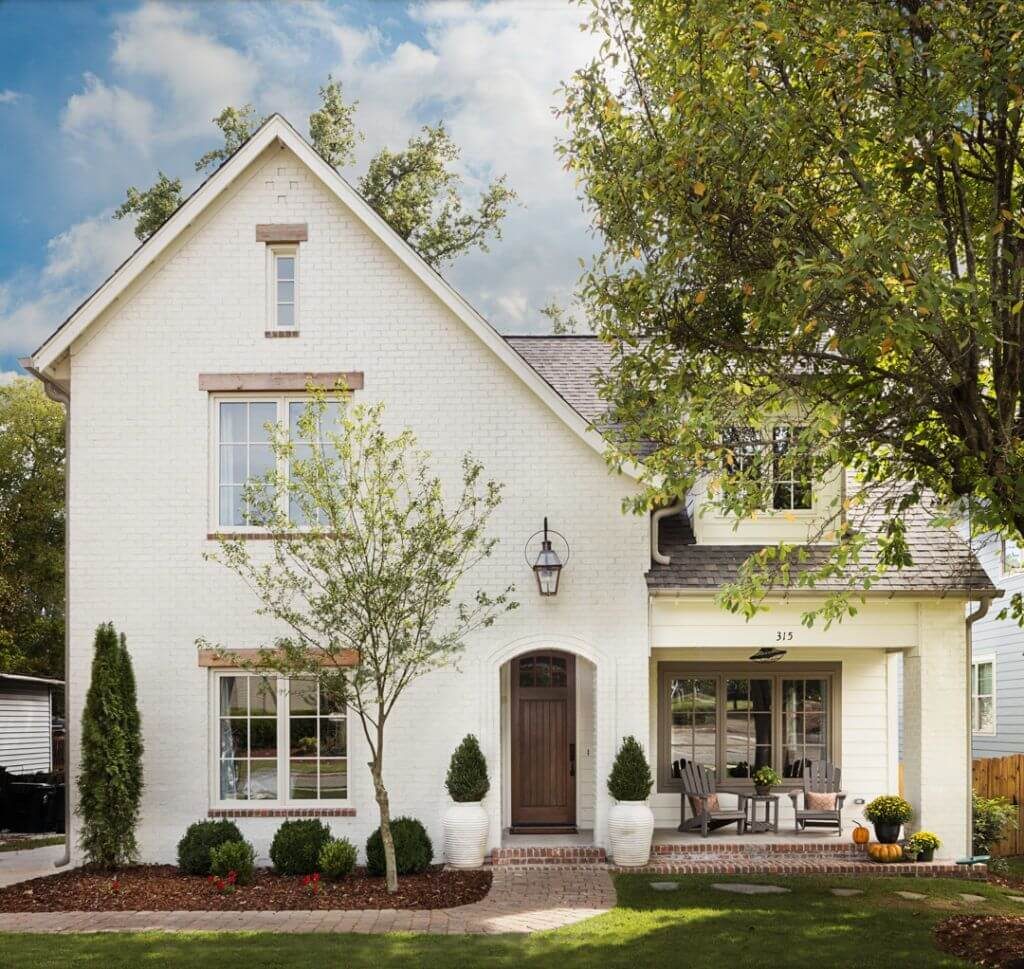 White Painted Brick House with White Sidings