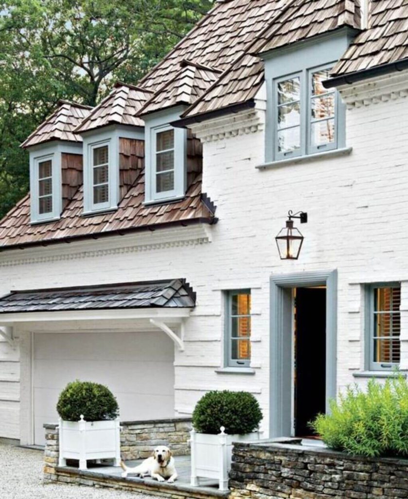 White Brick House Exterior with Vibrant Trims