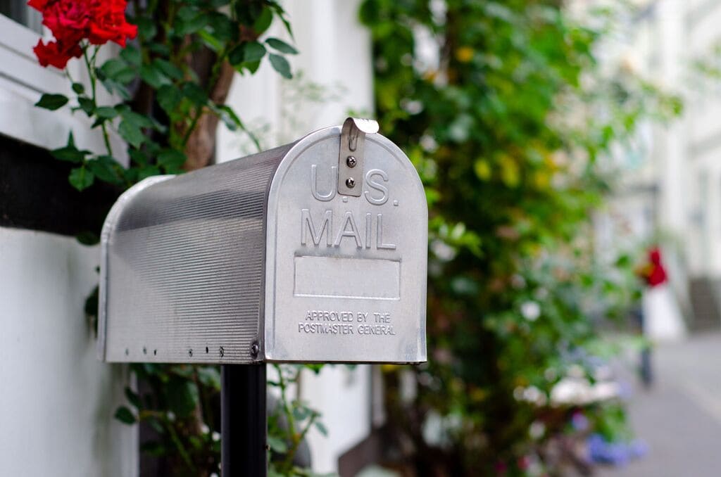 A mailbox on the side of a building

