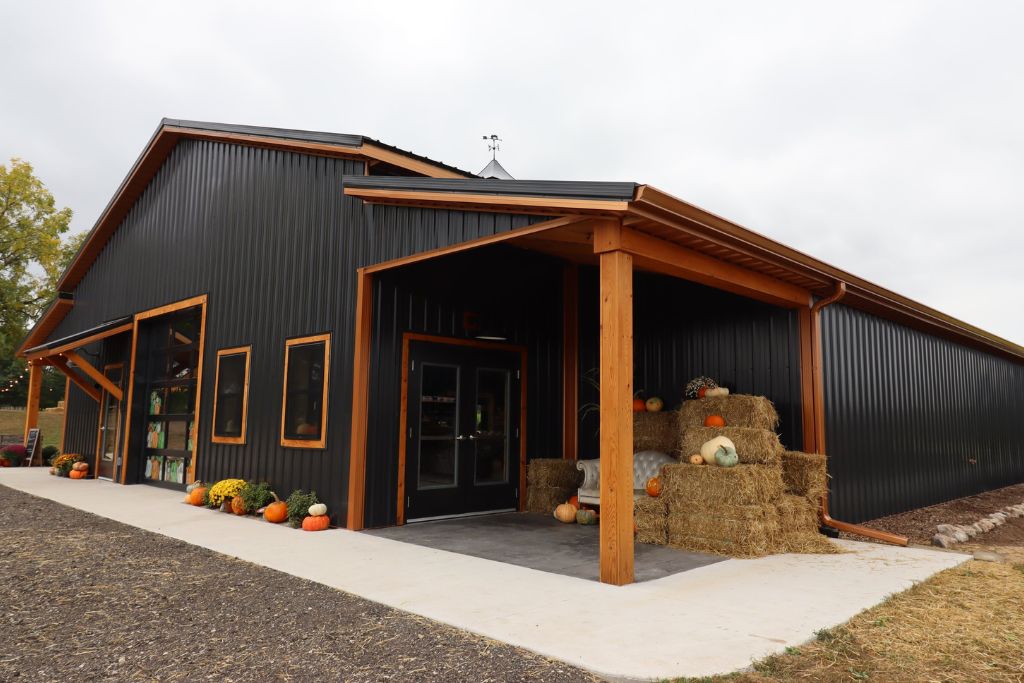Black Barndominium with Copper Trim