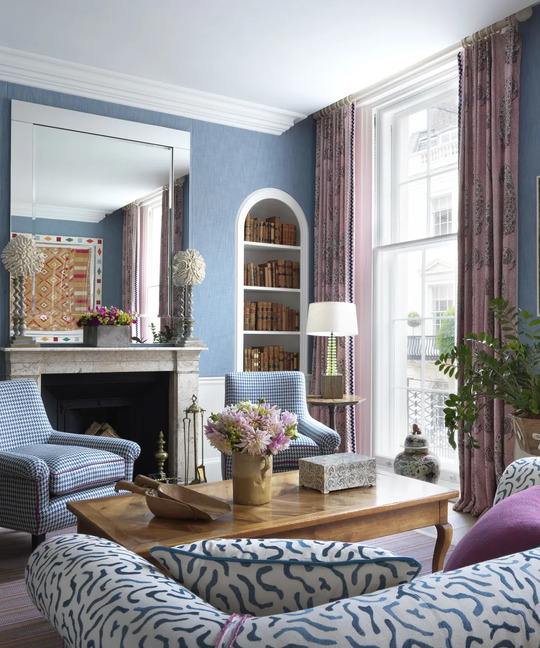 Living Room with Blue Walls and Purple Curtains